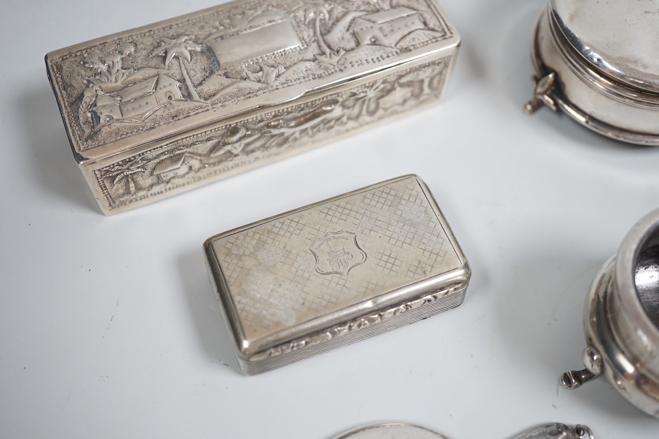 A collection of small silver items including two trinket boxes, a damaged mustard pot, two vesta case, snuff box etc. and a white metal box.